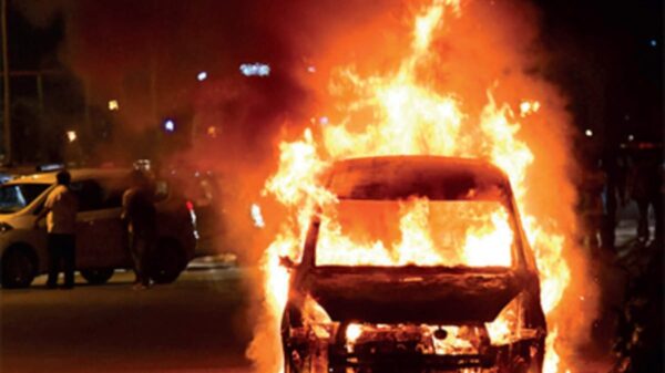 A moving car caught fire on Lokhra National Highway in Guwahati on Thursday. The occupants had a narrow escape as they managed to get out of the car before the flames engulfed the vehicle.